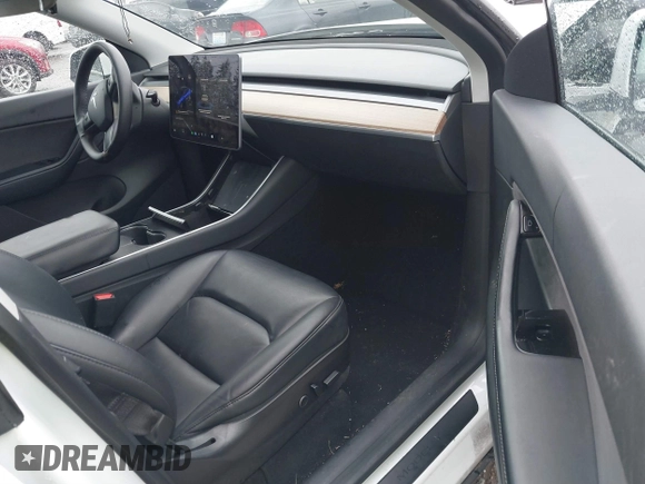 2021 Tesla Model Y Standard Range with VIN 5YJYGDED3MF103499, listed as a IAAI auction lot 41632064 with 132,846 mi miles and . Bid and sale history available at DreamBid. Image 5.