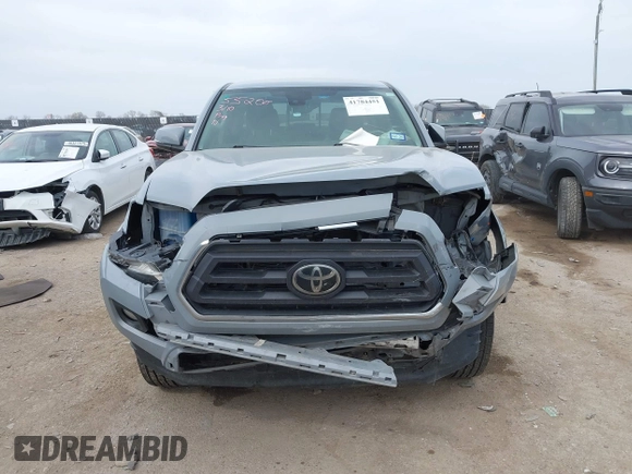 2021 Toyota Tacoma 4WD SR with VIN 5TFCZ5AN3MX260853, listed as a IAAI auction lot 41784451 with 122,244 mi miles. Bid and sale history available at carsss.com. Image 6.