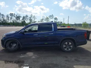 2019 Honda Ridgeline RTL-E with VIN 5FPYK3F76KB010613, listed as a IAAI auction lot 42079810 with 90,492 mi miles and . Bid and sale history available at DreamBid. Image 14.