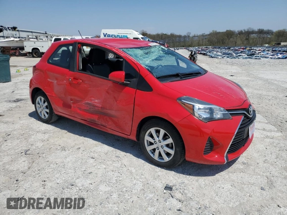 2015 Toyota Yaris L with VIN VNKJTUD34FA022097, listed as a Copart auction lot 53857825 with 106,680 mi miles and Salvage title. Bid and sale history available at DreamBid. Image 4.