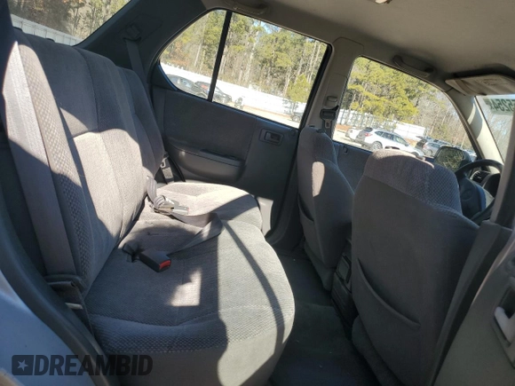 1999 Isuzu Rodeo S with VIN 4S2CK58W7X4357910, listed as a Copart auction lot 86955254 with 105,593 mi miles and Salvage Title. Bid and sale history available at DreamBid. Image 11.