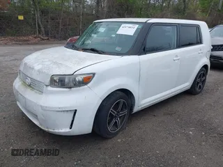 2009 Scion xB with VIN JTLKE50E491061737, listed as a IAAI auction lot 42174031 with 206,026 mi miles. Bid and sale history available at carsss.com. Image 2.