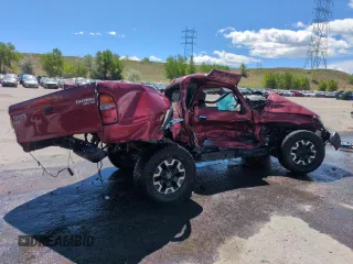1999 Toyota Tacoma with VIN 4TAWN72N5XZ522024, listed as a Copart auction lot 57479515 with Not provided miles and Non repairable. Bid and sale history available at DreamBid. Image 3.