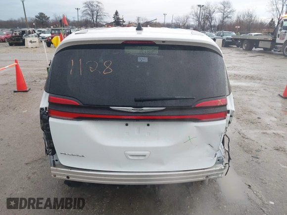 2023 Chrysler Pacifica Touring L with VIN 2C4RC1BG6PR520945, listed as a IAAI auction lot 41591128 with 70,351 mi miles and . Bid and sale history available at DreamBid. Image 17.