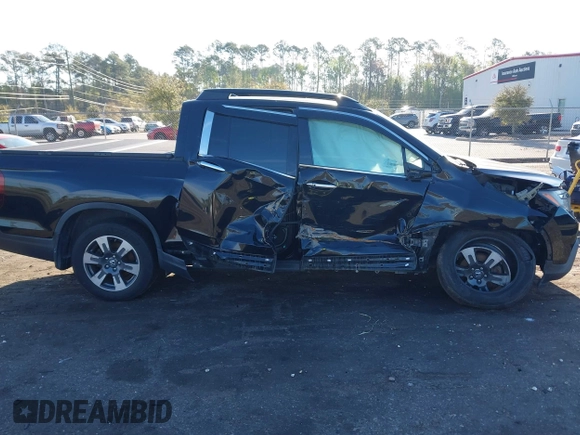 2018 Honda Ridgeline RTL-E z VIN 5FPYK3F78JB013981, wystawiony jako IAAI lot #41844954 z przebiegiem 101 794 mil mil oraz . Historia ofert i sprzedaży dostępna na DreamBid. Obrazek 12.