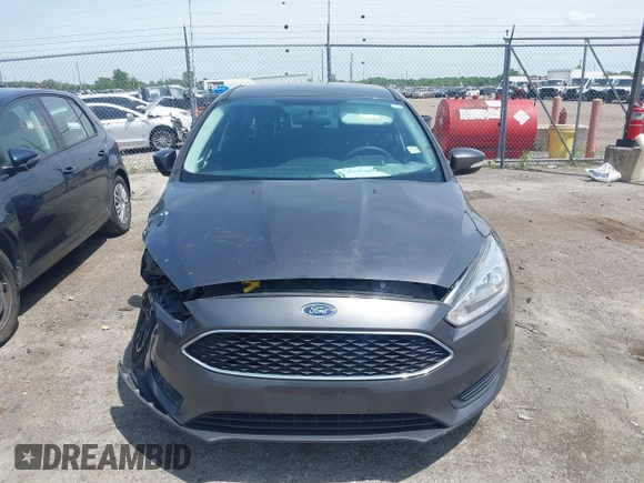 2017 Ford Focus SE with VIN 1FADP3F2XHL235013, listed as a IAAI auction lot 42370565 with 112,276 mi miles and . Bid and sale history available at DreamBid. Image 12.