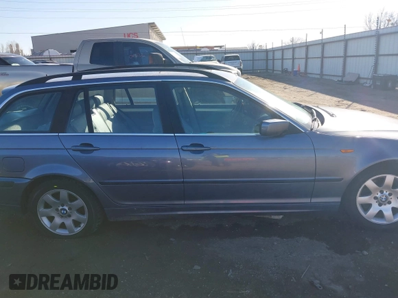 2002 BMW 3 Series 325i with VIN WBAEN33492EZ15195, listed as a IAAI auction lot 38505385 with 134,992 mi miles. Bid and sale history available at carsss.com. Image 14.