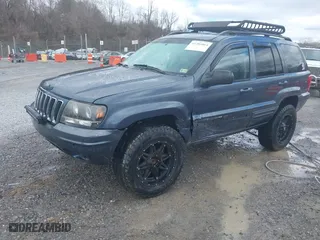 2003 Jeep Grand Cherokee Limited with VIN 1J4GW58N43C521617, listed as a IAAI auction lot 41781064 with 228,086 mi miles. Bid and sale history available at carsss.com. Image 2.