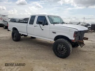 1994 Ford F-250 with VIN 1FTHX25H5RKB57176, listed as a Copart auction lot 63432875 with 188,923 mi miles and Salvage title. Bid and sale history available at DreamBid. Image 4.