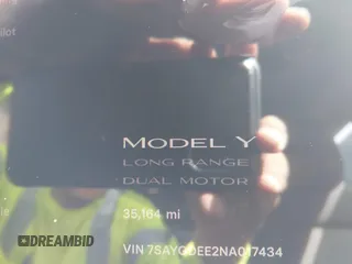 2022 Tesla Model Y Long Range with VIN 7SAYGDEE2NA017434, listed as a IAAI auction lot 41842025 with 35,164 mi miles and . Bid and sale history available at DreamBid. Image 7.