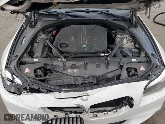 2014 BMW 5 Series 535d with VIN WBAXA5C58ED690402, listed as a Copart auction lot 48124575 with 153,702 mi miles and Salvage Title. Bid and sale history available at DreamBid. Image 11.