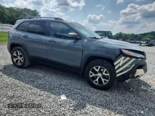 2014 Jeep Cherokee Trailhawk с VIN 1C4PJMBS1EW212024, выставлен на аукционе Copart как лот 58825265 с пробегом 99 087 миль миль и Списание • Salvage title. История ставок и продаж доступна на DreamBid. Изображение 4.