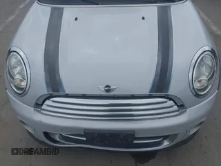 2014 MINI Convertible z VIN WMWZN3C52ET569565, wystawiony jako IAAI lot #42564988 z przebiegiem 66 035 mil mil oraz . Historia ofert i sprzedaży dostępna na DreamBid. Obrazek 6.