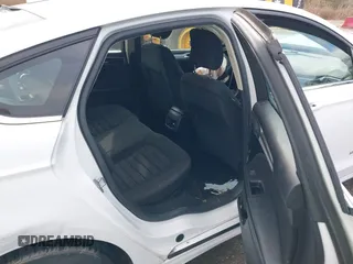 2019 Ford Fusion Hybrid SE with VIN 3FA6P0LUXKR104850, listed as a IAAI auction lot 41870242 with 114,943 mi miles. Bid and sale history available at carsss.com. Image 8.