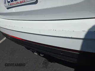 2023 Volkswagen Atlas SE z VIN 1V2HR2CA4PC526289, wystawiony jako IAAI lot #42734426 z przebiegiem 46 454 mil mil oraz . Historia ofert i sprzedaży dostępna na DreamBid. Obrazek 10.