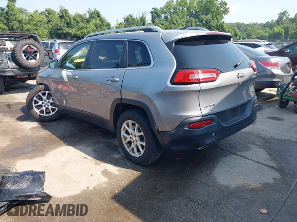2015 Jeep Cherokee Latitude with VIN 1C4PJMCS2FW789144, listed as a IAAI auction lot 42837222 with 99,759 mi miles and . Bid and sale history available at DreamBid. Image 3.