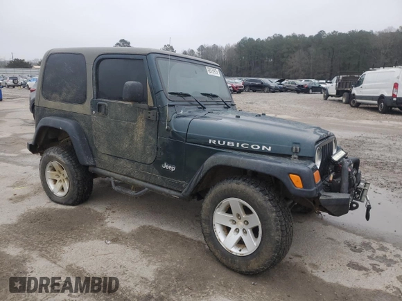 2005 Jeep Wrangler Rubicon with VIN 1J4FA69S95P377014, listed as a Copart auction lot 42676915 with 130,571 mi miles and Salvage Title. Bid and sale history available at carsss.com. Image 4.