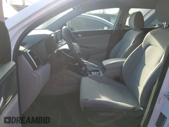 2019 Hyundai Tucson SE with VIN KM8J2CA44KU063420, listed as a Copart auction lot 53959745 with 33,880 mi miles and Salvage Title. Bid and sale history available at carsss.com. Image 7.