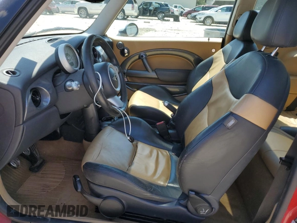 2005 MINI Hardtop S with VIN WMWRE33475TD92831, listed as a Copart auction lot 55299615 with 155,632 mi miles and Salvage title. Bid and sale history available at DreamBid. Image 7.