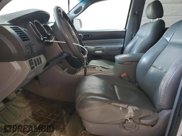 2007 Toyota Tacoma z VIN 5TEMU52N27Z372431, wystawiony jako Copart lot #56699575 z przebiegiem 284 462 mil mil oraz Szkoda całkowita • Salvage title. Historia ofert i sprzedaży dostępna na DreamBid. Obrazek 7.