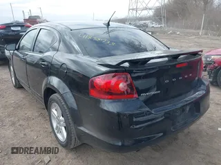 2013 Dodge Avenger SXT with VIN 1C3CDZCG5DN741112, listed as a IAAI auction lot 41838733 with 179,000 mi miles and . Bid and sale history available at carsss.com. Image 3.