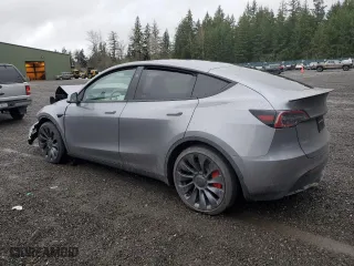 2025 Tesla Model Y Performance with VIN 7SAYGDEF2SF232223, listed as a Copart auction lot 50419235 with 0 mi miles and Salvage Title. Bid and sale history available at carsss.com. Image 2.