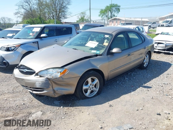 2003 Ford Taurus SE Standard with VIN 1FAFP53U73A245044, listed as a IAAI auction lot 41999582 with 85,870 mi miles. Bid and sale history available at carsss.com. Image 2.