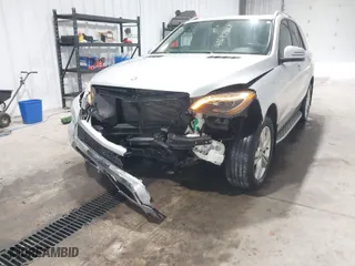 2015 Mercedes-Benz M-Class ML 350 with VIN 4JGDA5HB5FA564792, listed as a IAAI auction lot 41649427 with 70,764 mi miles. Bid and sale history available at carsss.com. Image 6.