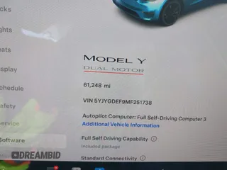 2021 Tesla Model Y Performance with VIN 5YJYGDEF9MF251738, listed as a IAAI auction lot 41708950 with 61,248 mi miles and . Bid and sale history available at DreamBid. Image 7.