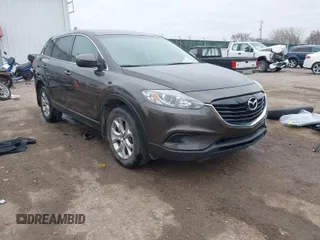 2015 Mazda CX-9 Touring with VIN JM3TB2CA5F0469348, listed as a IAAI auction lot 41516084 with 134,460 mi miles. Bid and sale history available at carsss.com. Image 1.