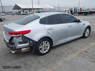 2016 Kia Optima LX with VIN KNAGT4L3XG5111796, listed as a IAAI auction lot 42106116 with 138,184 mi miles. Bid and sale history available at carsss.com. Image 4.