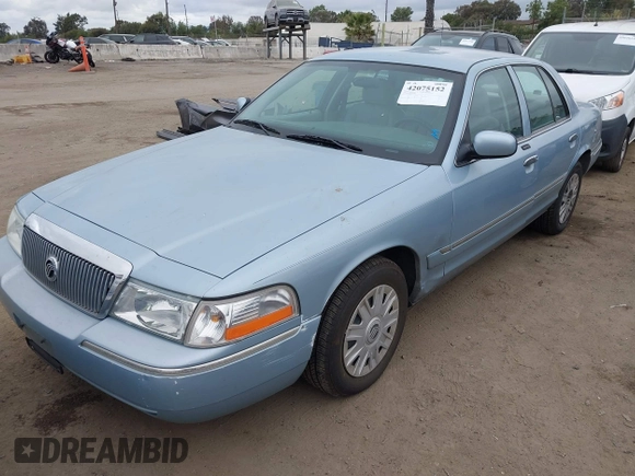 2005 Mercury Grand Marquis GS z VIN 2MEFM74W45X629662, wystawiony jako IAAI lot #42075152 z przebiegiem 65 941 mil mil oraz . Historia ofert i sprzedaży dostępna na DreamBid. Obrazek 2.