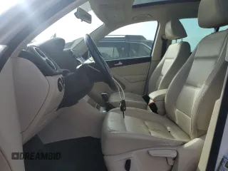 2012 Volkswagen Tiguan SE with VIN WVGAV7AX6CW555896, listed as a Copart auction lot 46454225 with 150,633 mi miles and Salvage Title. Bid and sale history available at DreamBid. Image 7.