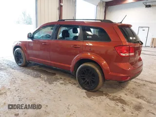 2013 Dodge Journey SXT with VIN 3C4PDCBG1DT674911, listed as a IAAI auction lot 41713407 with 153,757 mi miles and . Bid and sale history available at DreamBid. Image 3.