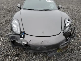 2014 Porsche Cayman with VIN WP0AA2A81EK170848, listed as a Copart auction lot 54178125 with 42,979 mi miles and Salvage Title. Bid and sale history available at DreamBid. Image 22.