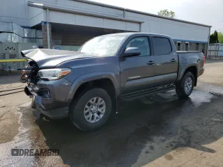 2018 Toyota Tacoma SR with VIN 3TMCZ5AN9JM153503, listed as a Copart auction lot 59543015 with 94,848 mi miles and Salvage title. Bid and sale history available at DreamBid. Image 1.