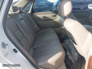 2002 Toyota Avalon XL with VIN 4T1BF28B82U233060, listed as a IAAI auction lot 41640193 with 224,429 mi miles. Bid and sale history available at carsss.com. Image 8.