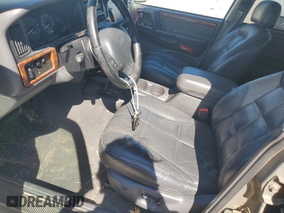 1997 Jeep Grand Cherokee Limited with VIN 1J4GZ78Y4VC567237, listed as a Copart auction lot 49059105 with 177,478 mi miles and Salvage Title. Bid and sale history available at carsss.com. Image 7.