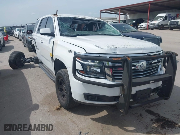 2016 Chevrolet Tahoe Commercial z VIN 1GNLCDEC9GR299693, wystawiony jako IAAI lot #42630221 z przebiegiem 127 081 mil mil oraz . Historia ofert i sprzedaży dostępna na DreamBid. Obrazek 1.