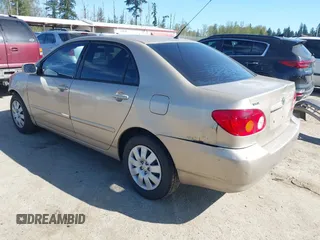 2004 Toyota Corolla CE with VIN 1NXBR32E24Z288154, listed as a IAAI auction lot 42073969 with 226,820 mi miles. Bid and sale history available at carsss.com. Image 3.