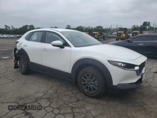 2023 Mazda CX-30 S with VIN 3MVDMBAM8PM557537, listed as a Copart auction lot 61154835 with 23,450 mi miles and Salvage title. Bid and sale history available at DreamBid. Image 4.
