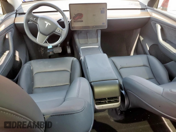 2024 Tesla Model Y Long Range with VIN 7SAYGDEE5RA235910, listed as a Copart auction lot 60988605 with 23,882 mi miles and Salvage title. Bid and sale history available at DreamBid. Image 8.