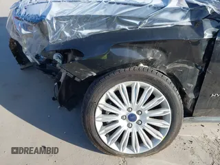 2015 Ford Fusion S Hybrid with VIN 3FA6P0UU9FR106402, listed as a IAAI auction lot 41983961 with 27,122 mi miles. Bid and sale history available at carsss.com. Image 14.