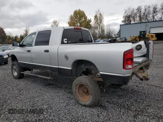 2006 Dodge Ram 3500 Laramie with VIN 3D7LX39C66G149790, listed as a Copart auction lot 79558594 with 147,389 mi miles and Salvage Title. Bid and sale history available at carsss.com. Image 2.