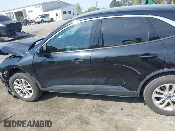 2020 Ford Escape SE z VIN 1FMCU9G69LUB40332, wystawiony jako IAAI lot #42006879 z przebiegiem 82 291 mil mil oraz . Historia ofert i sprzedaży dostępna na DreamBid. Obrazek 14.