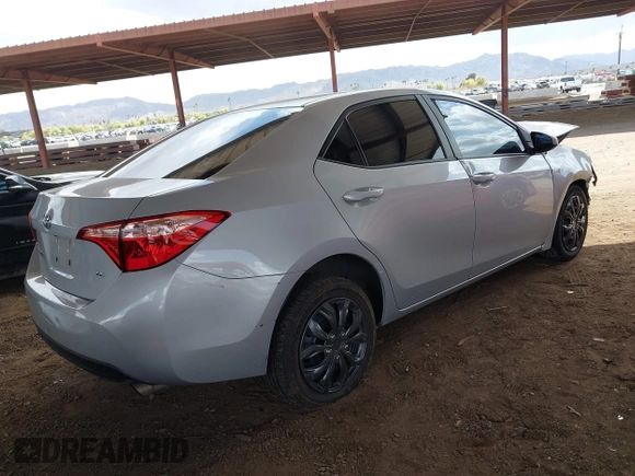 2018 Toyota Corolla L with VIN 2T1BURHE3JC051646, listed as a IAAI auction lot 41959264 with 123,036 mi miles and . Bid and sale history available at DreamBid. Image 4.