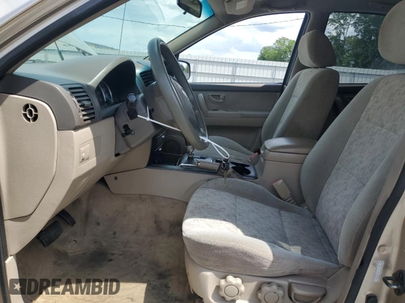 2007 Kia Sorento LX with VIN KNDJD736X75717813, listed as a Copart auction lot 56456025 with 145,722 mi miles and Salvage title. Bid and sale history available at DreamBid. Image 7.