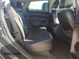 2015 Cadillac SRX Luxury Collection z VIN 3GYFNBE36FS608322, wystawiony jako Copart lot #88860835 z przebiegiem 141 627 mil mil oraz Szkoda całkowita • Salvage title. Historia ofert i sprzedaży dostępna na DreamBid. Obrazek 11.