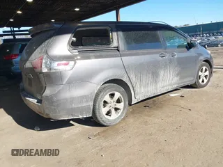 2011 Toyota Sienna with VIN 5TDZK3DC0BS075319, listed as a IAAI auction lot 41458855 with 211,583 mi miles. Bid and sale history available at carsss.com. Image 4.