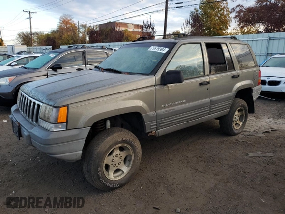 1997 Jeep Grand Cherokee Laredo with VIN 1J4GZ58S1VC741586, listed as a Copart auction lot 77619394 with 0 mi miles and Clean Title. Bid and sale history available at carsss.com. Image 1.